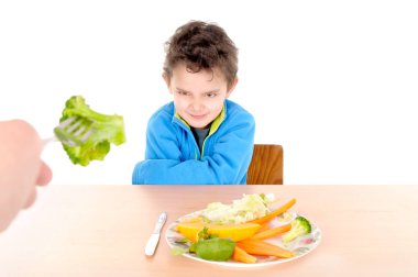 masada oturan çocuk