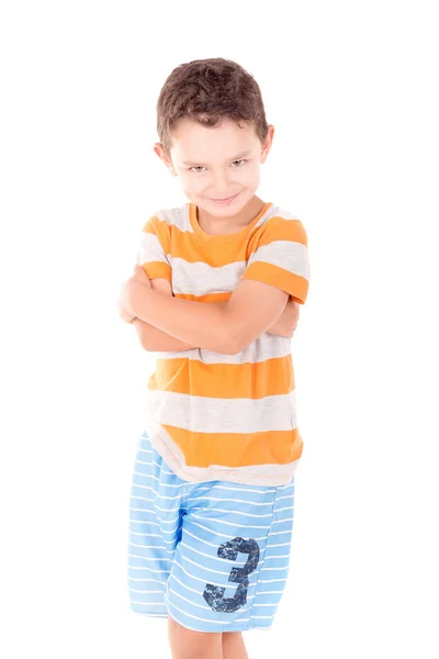 Мальчик в синих пляжных шортах — стоковое фото
