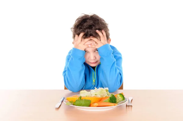 Niño sentado en la mesa — Foto de Stock