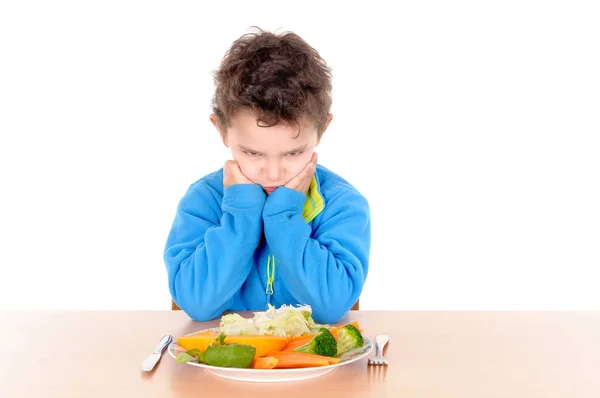 Niño sentado en la mesa — Foto de Stock