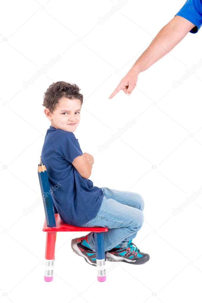 Person punishing little boy 