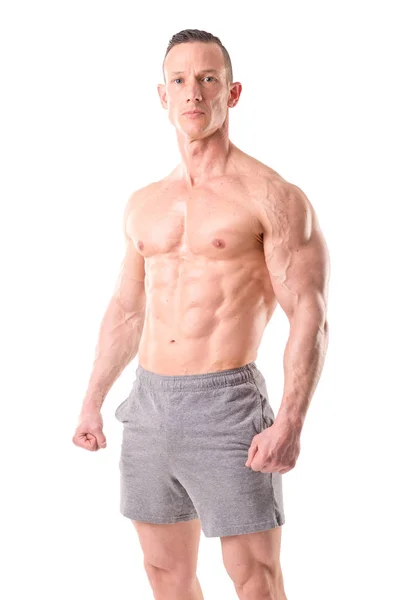 근육 질의 남자에 고립 된 화이트 포즈에 맞게 — 스톡 사진