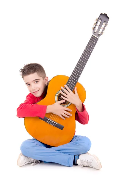 Kleine jongen met gitaar — Stockfoto