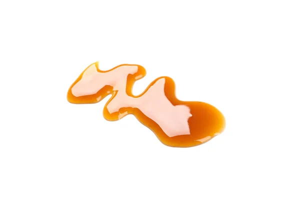 Sweet caramel sauce isolated on white background, close up — Stock Photo, Image