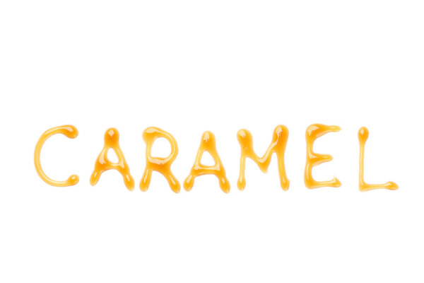 Inscription Caramel isolated on white background, top view