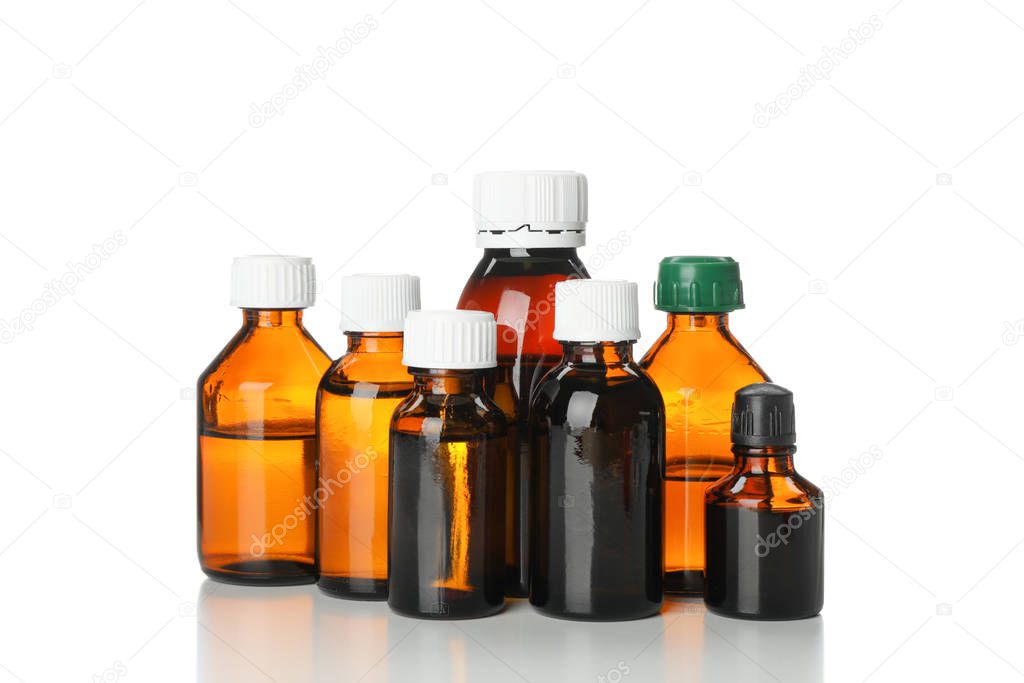 Brown medical bottles isolated on white background. Health care
