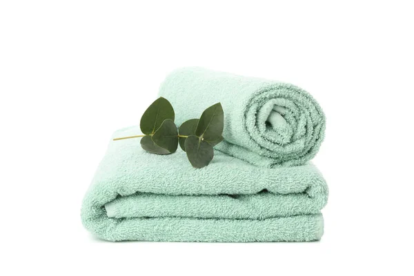 Folded towels and eucalyptus isolated on white background — Stock Photo, Image