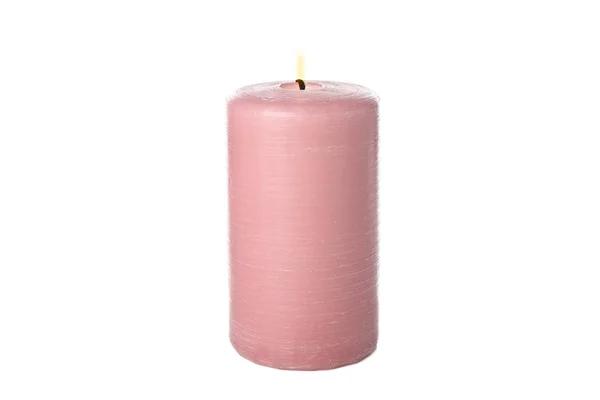 Рожева горіння свічка ізольована на білому тлі — стокове фото