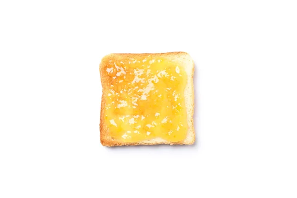 흰 바탕에 따로 떨어진 오렌지 잼으로 토스트를 하시오 — 스톡 사진