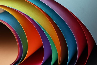 Çok renkli çarşaflar, arka plan desenli, kapat. Özet geç