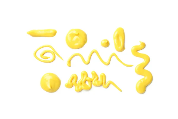 Σετ διαφορετικών επιχρισμάτων κίτρινης σάλτσας που απομονώνονται σε λευκό backgroun — Φωτογραφία Αρχείου
