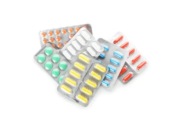 Stelletje pillen in blisterverpakking geïsoleerd op witte achtergrond — Stockfoto
