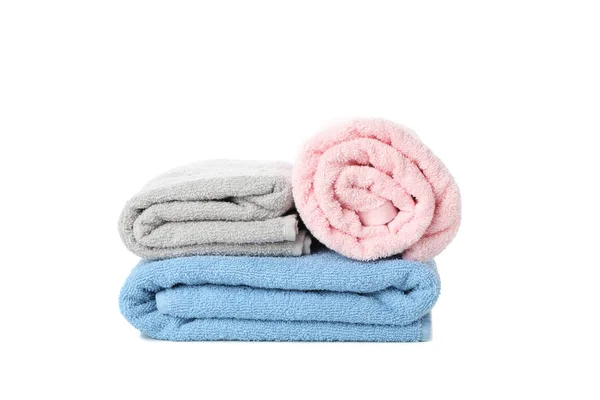Folded color towels isolated on white background, close up — Stock Photo, Image