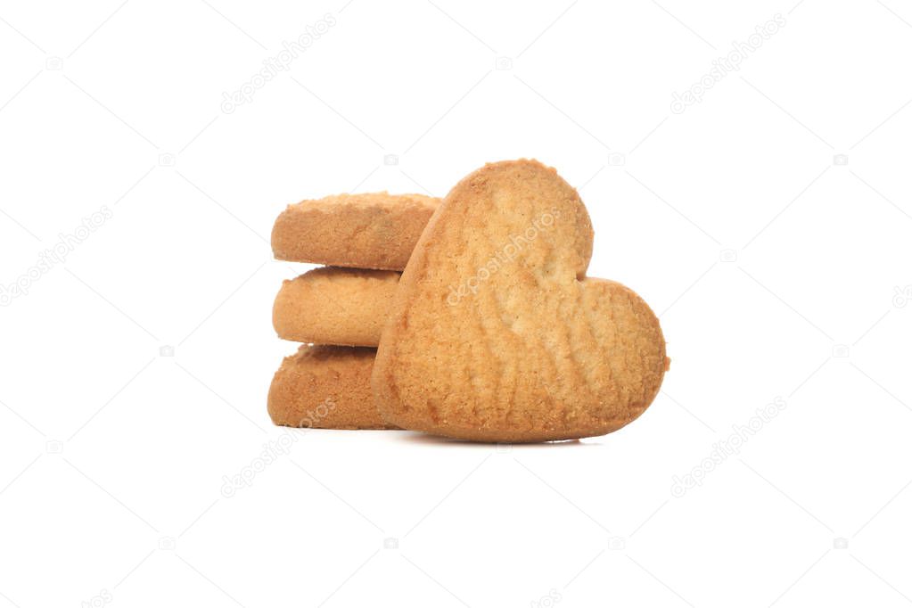 Pile of heart shaped cookies isolated on white background
