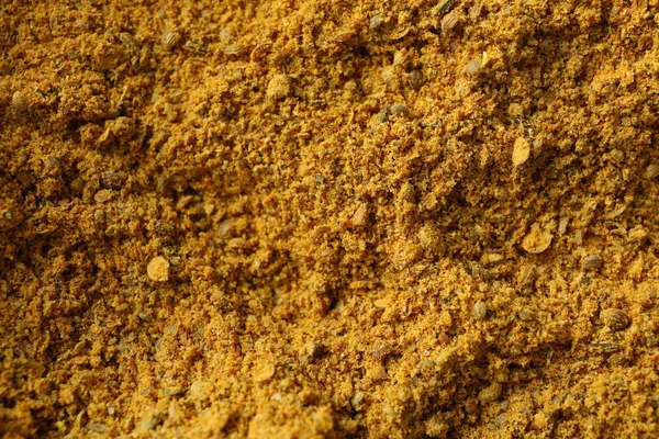 Curry poudre épice texture fond, gros plan — Photo