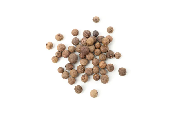 Peppercorns isolado no fundo branco, vista superior — Fotografia de Stock