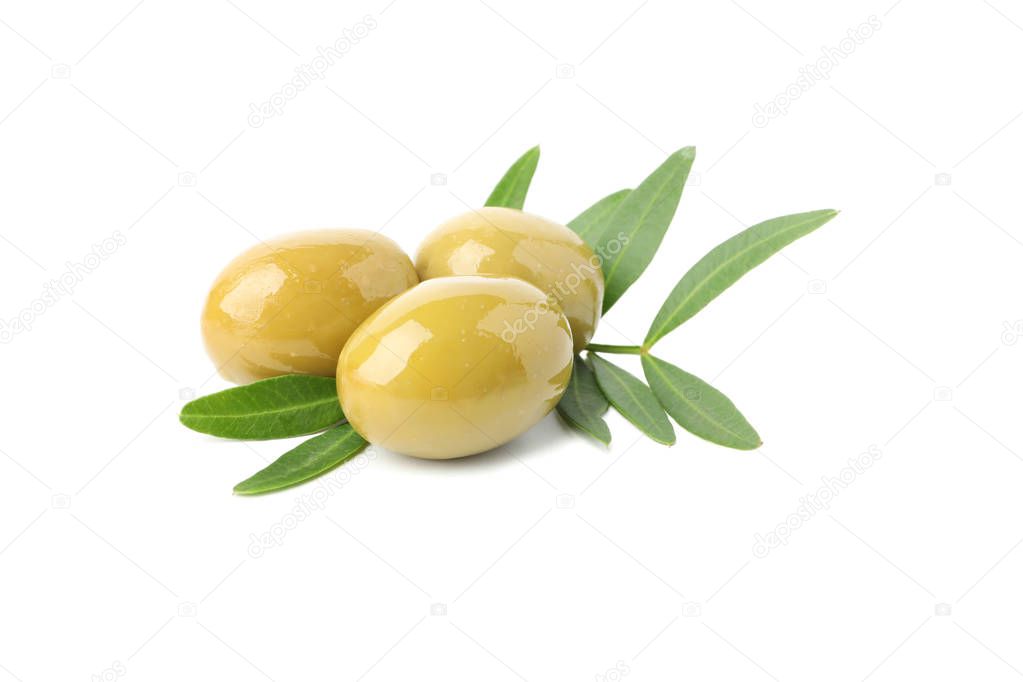Tasty green olives and leaves isolated on white background, clos