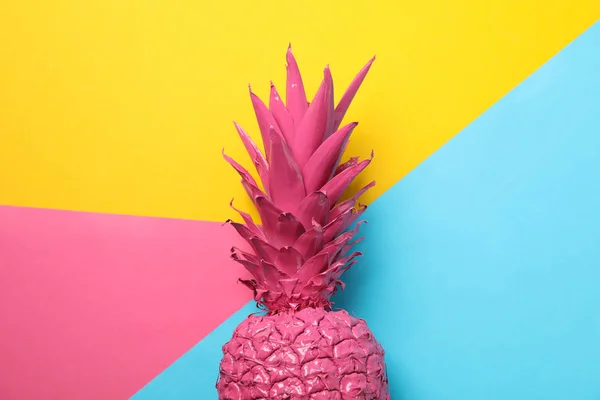 Painted pink pineapple on multicolor background, space for text — Stock Photo, Image