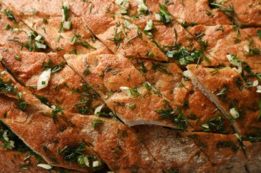 Lezzetli sarımsaklı ekmek dokusu, kapat.