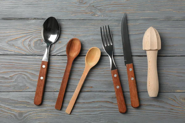 Cutlery on rustic wooden background, top view — Stockfoto