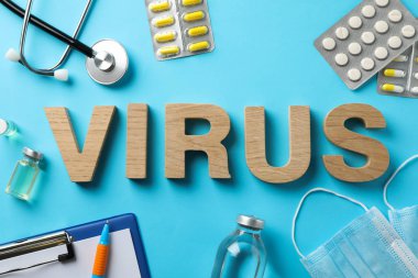 Inscription Virus on blue background with medical composition. H