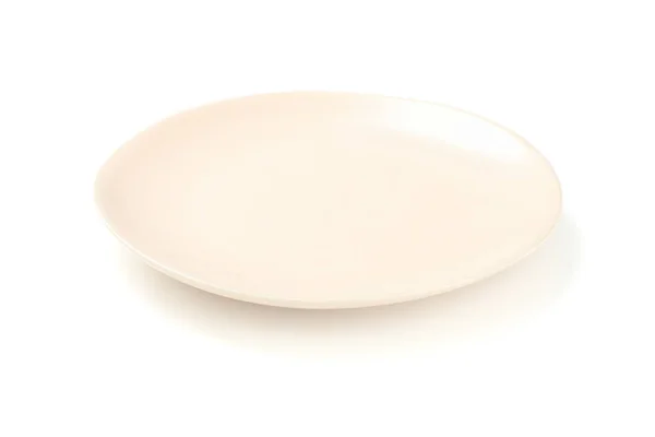 Assiette propre beige isolée sur fond blanc. Cuisine, service — Photo