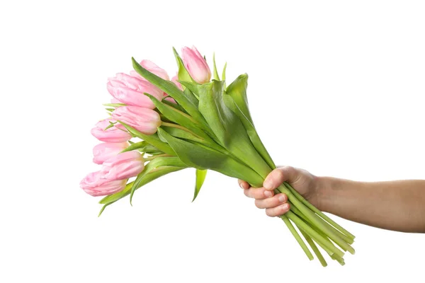 Мужская рука держит букет розовых тюльпанов, изолированных на белом фоне — стоковое фото
