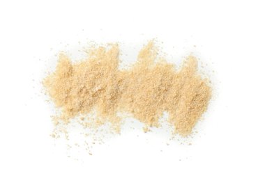 Brown sugar isolated on white background, top view