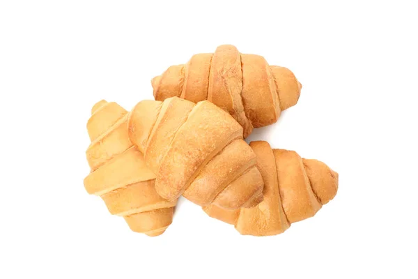 Croissants recém-assados isolados em fundo branco — Fotografia de Stock