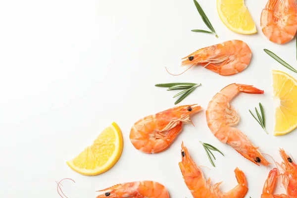 Composition with shrimps and spices on white background, top vie — 스톡 사진