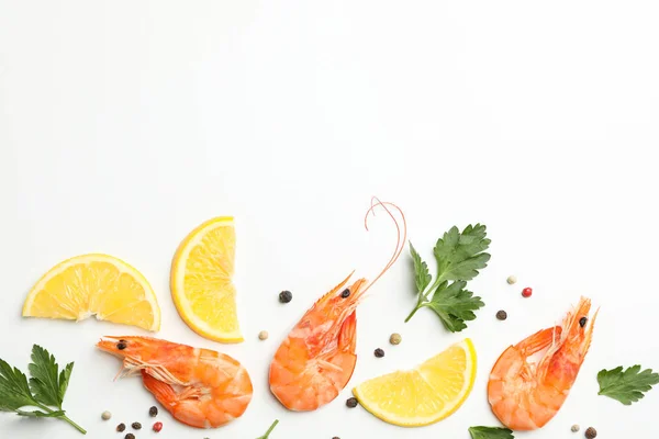 Composition with shrimps and spices on white background, top vie — 스톡 사진