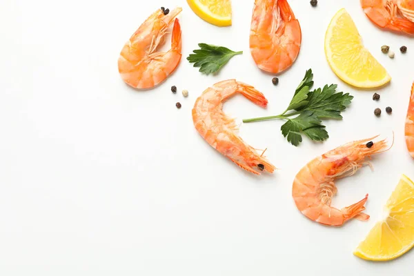 Composition with shrimps and spices on white background, top vie — 스톡 사진