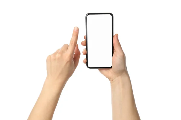 Manos femeninas sosteniendo el teléfono con pantalla vacía, aisladas en blanco — Foto de Stock