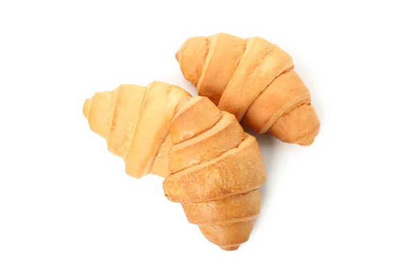 Frisch gebackene Croissants isoliert auf weißem Hintergrund — Stockfoto