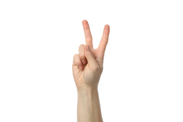 白い背景に孤立した2本の指を示す女性の手 — ストック写真