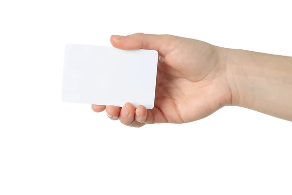 Female hand holding blank business card, isolated on white backg Royalty Free Stock Photos