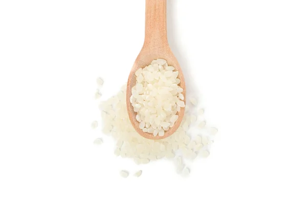 Colher de madeira com arroz isolado no fundo branco, close-up — Fotografia de Stock