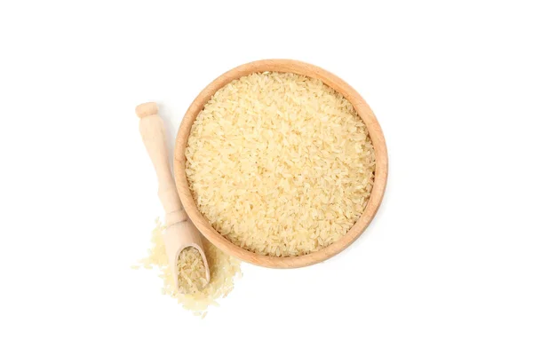 Tigela de madeira e colher com arroz isolado no fundo branco — Fotografia de Stock