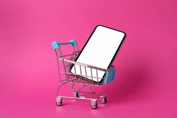 Teléfono Con Pantalla Vacía Carrito Compras Sobre Fondo Rosa Primer —  Fotos de Stock