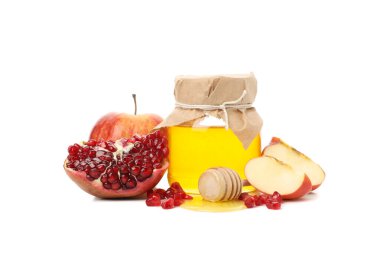 Elma, nar ve bal beyaz arka planda izole edilmiş. Doğal tedavi