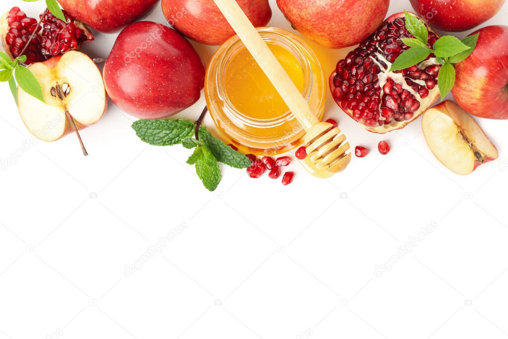 Apples, pomegranate, mint and honey isolated on white background. Natural treatment