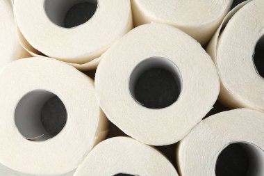 Tüm arka planda tuvalet kağıdı ruloları, üst görünüm
