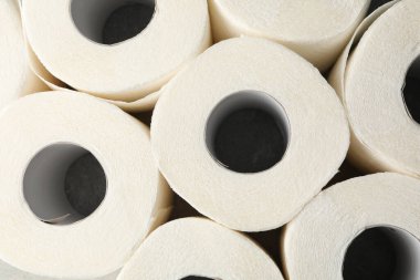 Tüm arka planda tuvalet kağıdı ruloları, üst görünüm