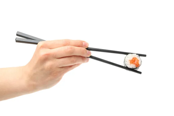 拿着筷子的女手拿着寿司卷 与白色背景隔离 — 图库照片