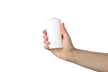 Kadın eli, beyaz arka planda izole edilmiş vücut deodorantı tutuyor.