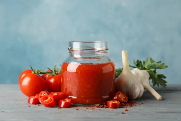 Jar Red Chilli Tomato Sauce Spices Wooden Table — Stock Photo, Image