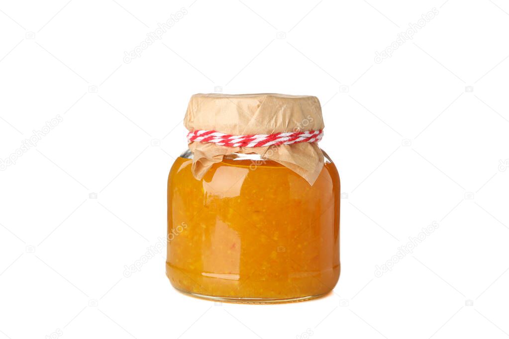 Glass jar with apricot jam isolated on white background