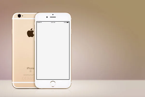 Gold Apple iPhone 7 mockup front and back side on gold background with copy space — Stock Photo, Image