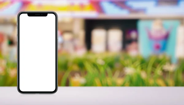 Smartphone mockup similar to iPhone X front and back sides on the desk in mall banner with copy space — Stock Photo, Image