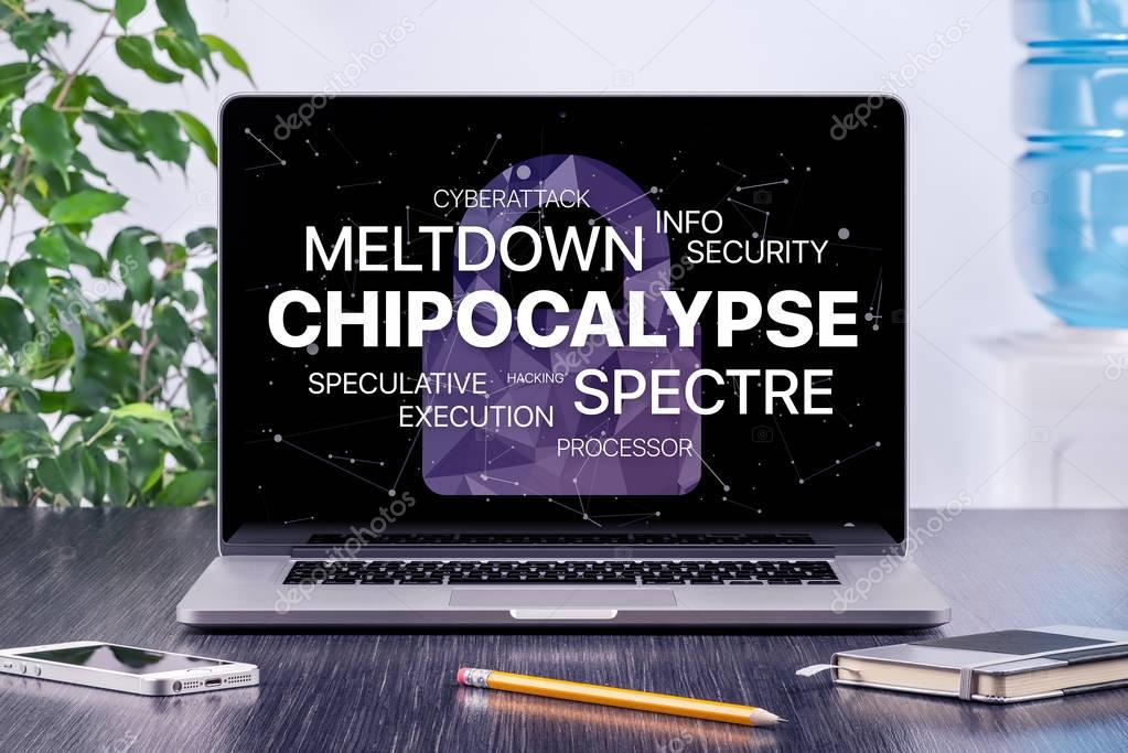 Chipocalypse concept with meltdown and spectre threat on laptop screen in office workspace